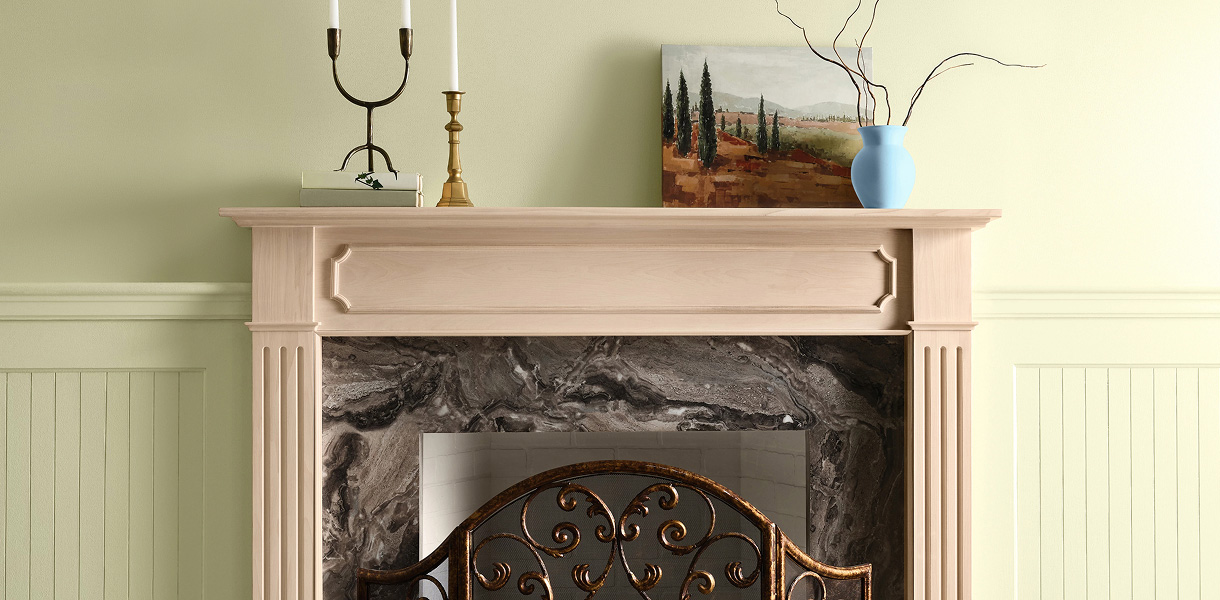 Fireplace surround stained with Minwax Pickled Oak.